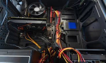 Custom PC build for music production with components on desk